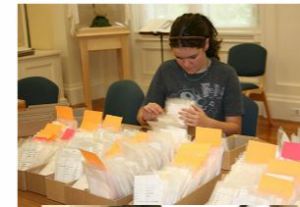 Alex organizing a returned loan