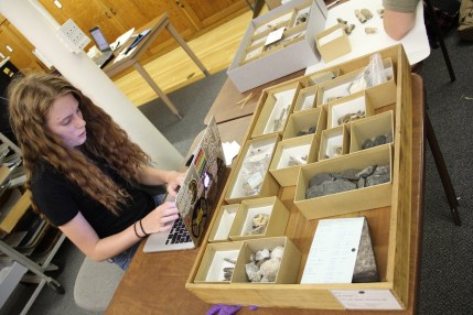 Work duty student inventorying a drawer