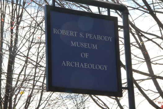 Image of blue sign for the Robert S. Peabody Museum of Archaeology on Andover's Main Street.
