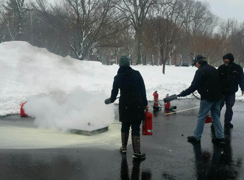 Fire extinguisher in use