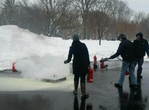 Fire extinguisher in use