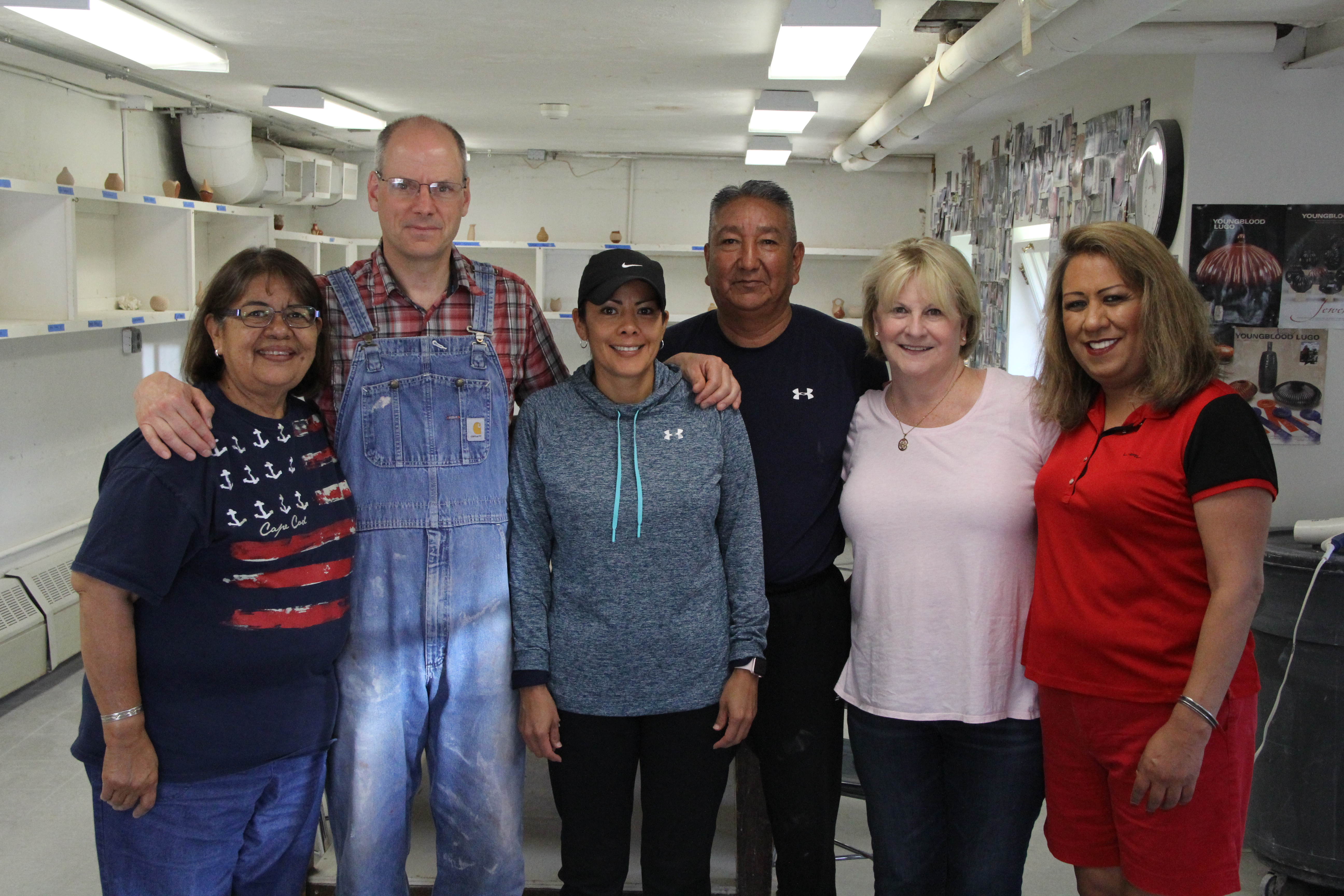 Image of Pueblo potters with ceramics instructor and blog author.