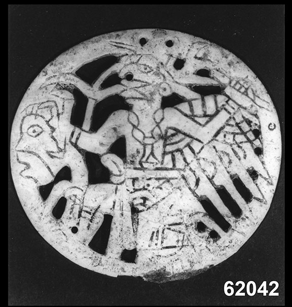 Image of shell gorget with dancing birdman figure.