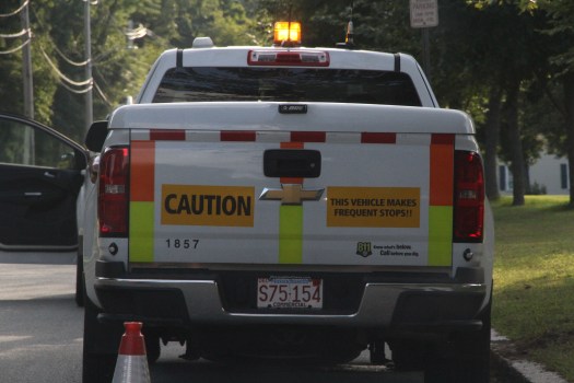 Image of utility truck parked next to Peabody building.