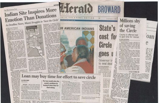 Image of newspaper articles spread out about the Miami Circle site.